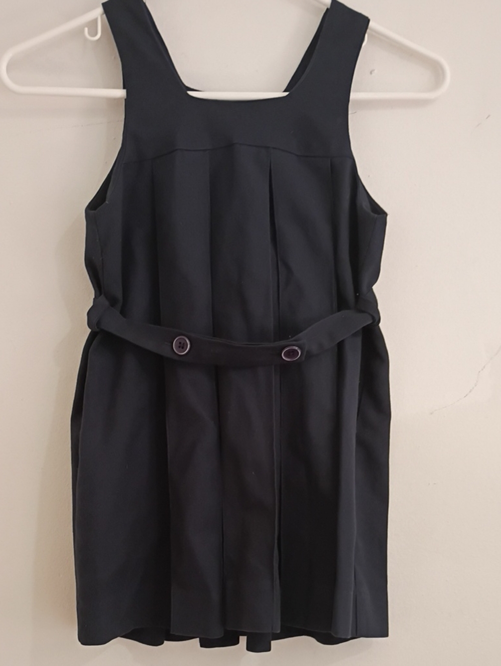 Girls' Navy Pleated Sleeveless School Dress with Buttoned Waist Accent